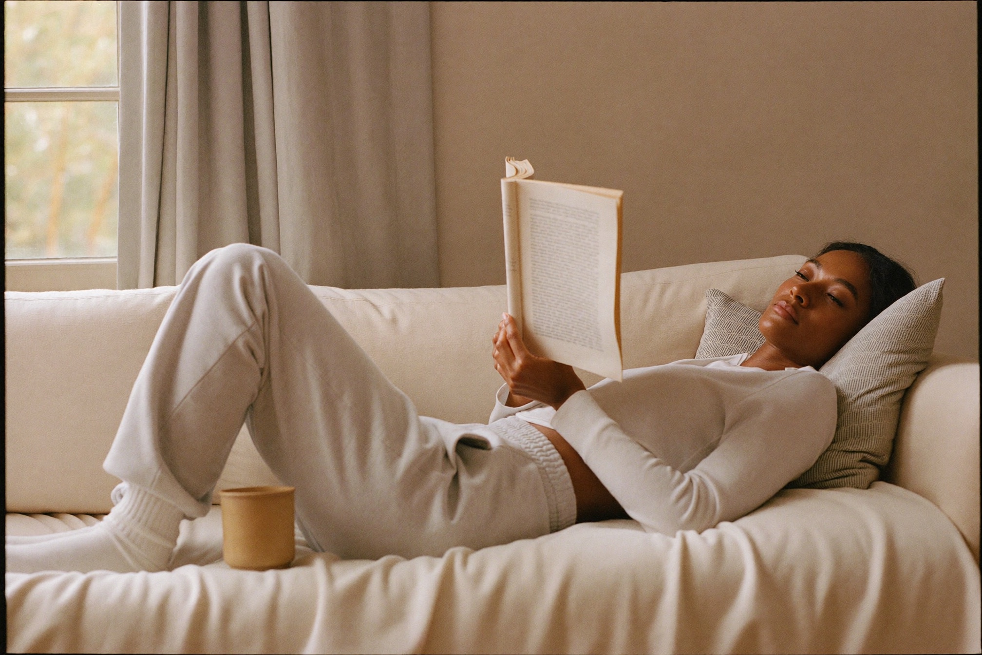 A woman resting comfortably at home during a calm recovery