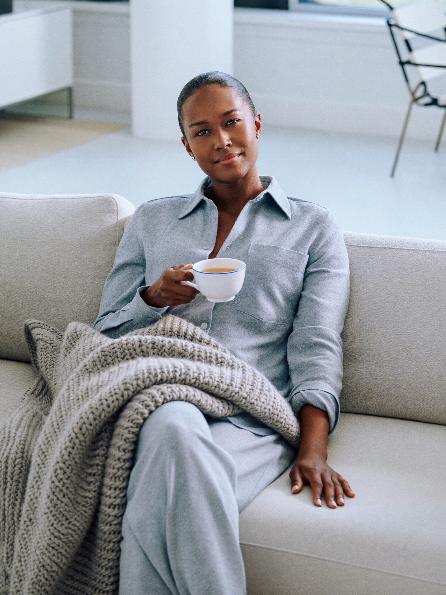 A calm adult resting comfortably at home during recovery