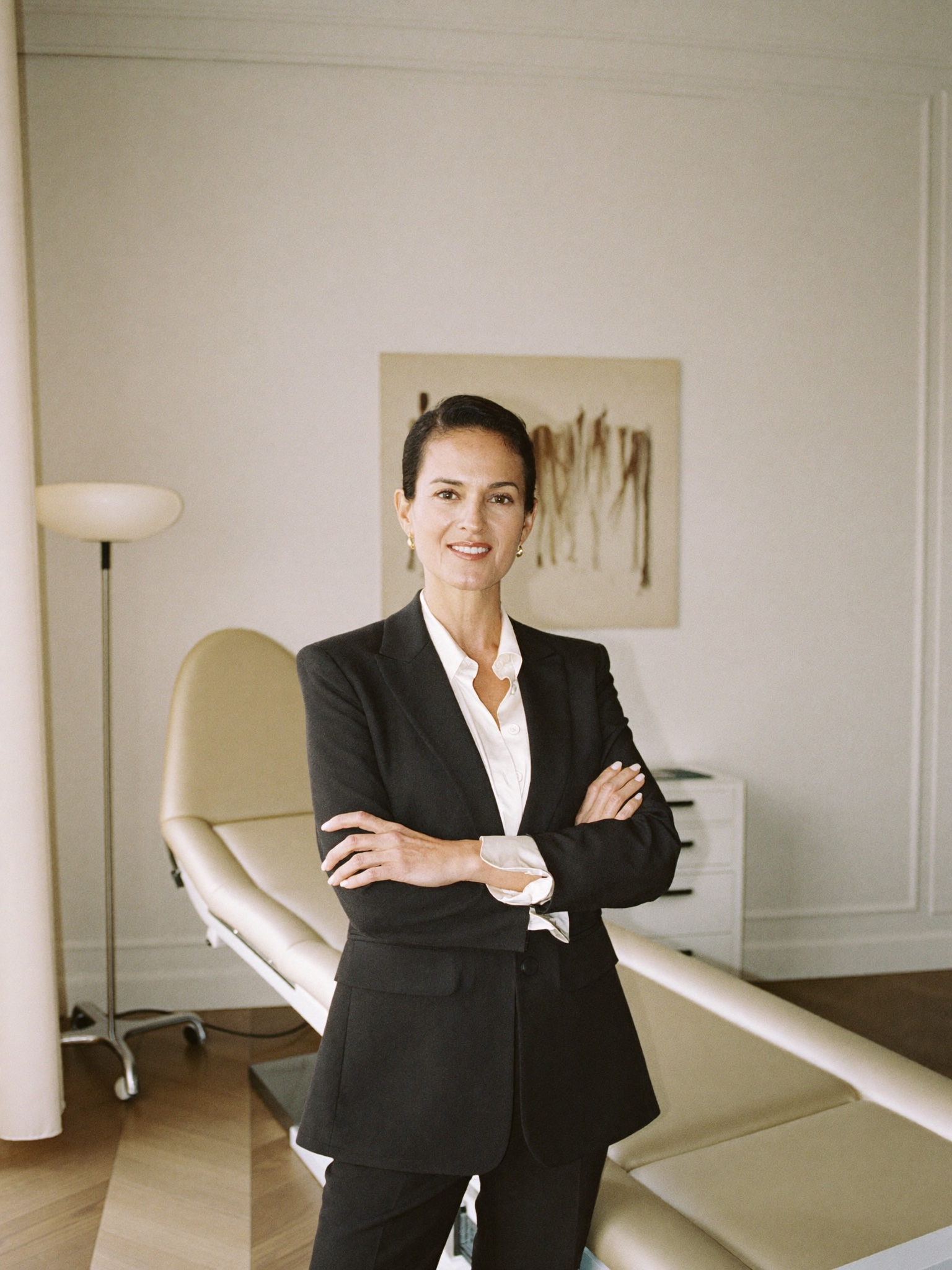 Dr. Élise Marchand, in her consultation room
